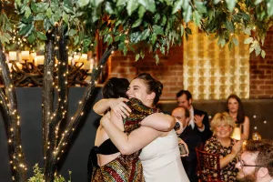 Katie hugging family member