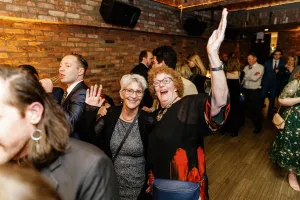 two ladies dancing at Katie and Zachary's wedding