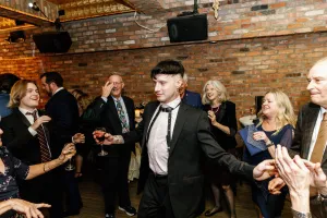 Man dancing at Katie and Zachary's wedding