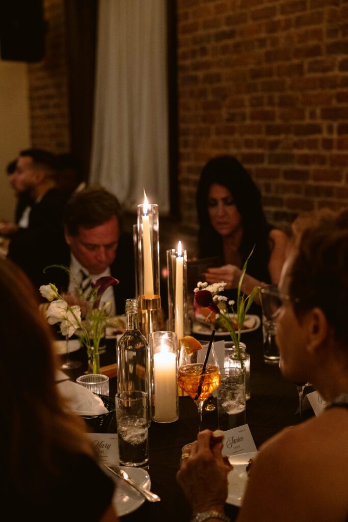 Wedding décor with candles and linens at Deity Brooklyn micro-wedding